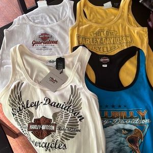 Harley Davidson Tank Tops. 3 are XL and the yellow one is L. One is NWT